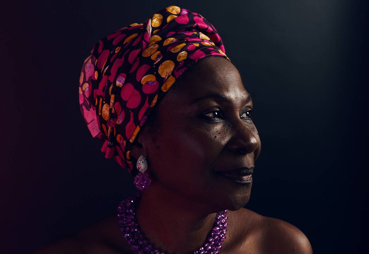 Close-up of protective hair wraps showing satin scarf neatly tied around natural hair